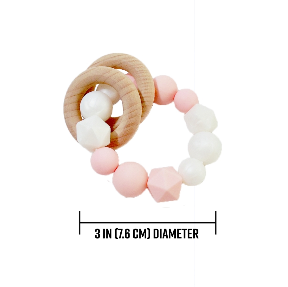 Pink baby girl teething bracelet wood rings